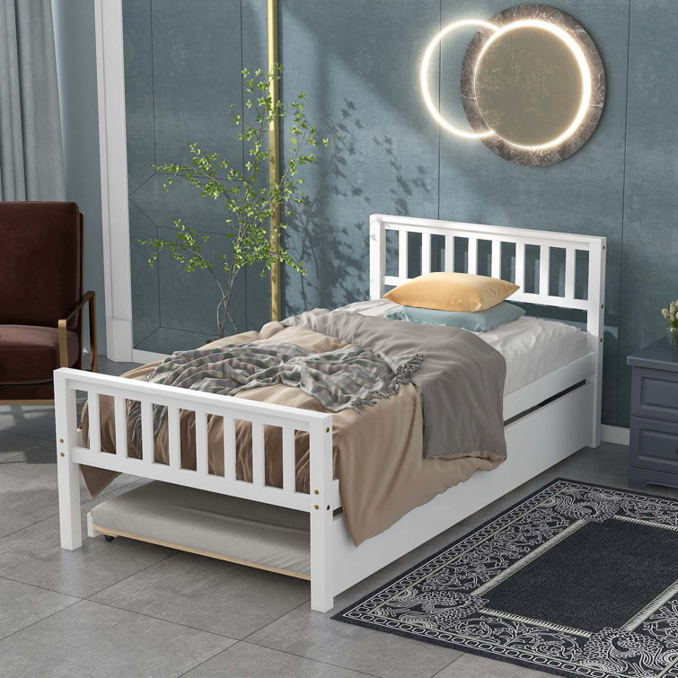 White wood twin shop bed with trundle